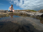 2016_0730_123252_004 Jenni sitting by rock pool.JPG